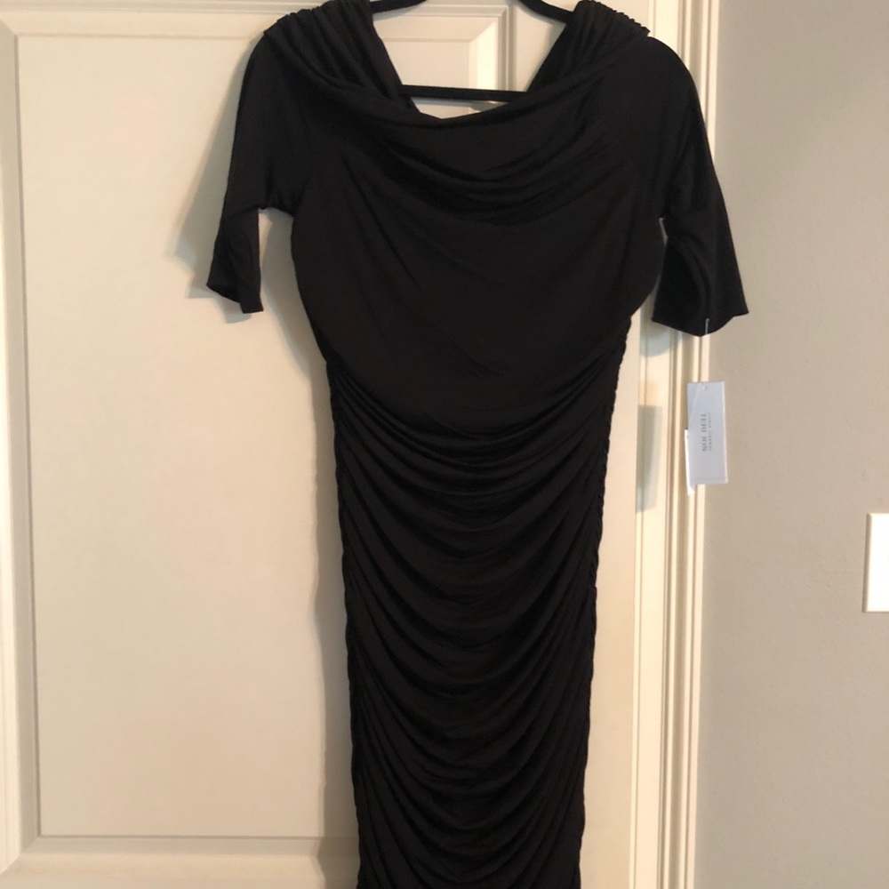 Ruched cocktail dress with ¾ sleeves
